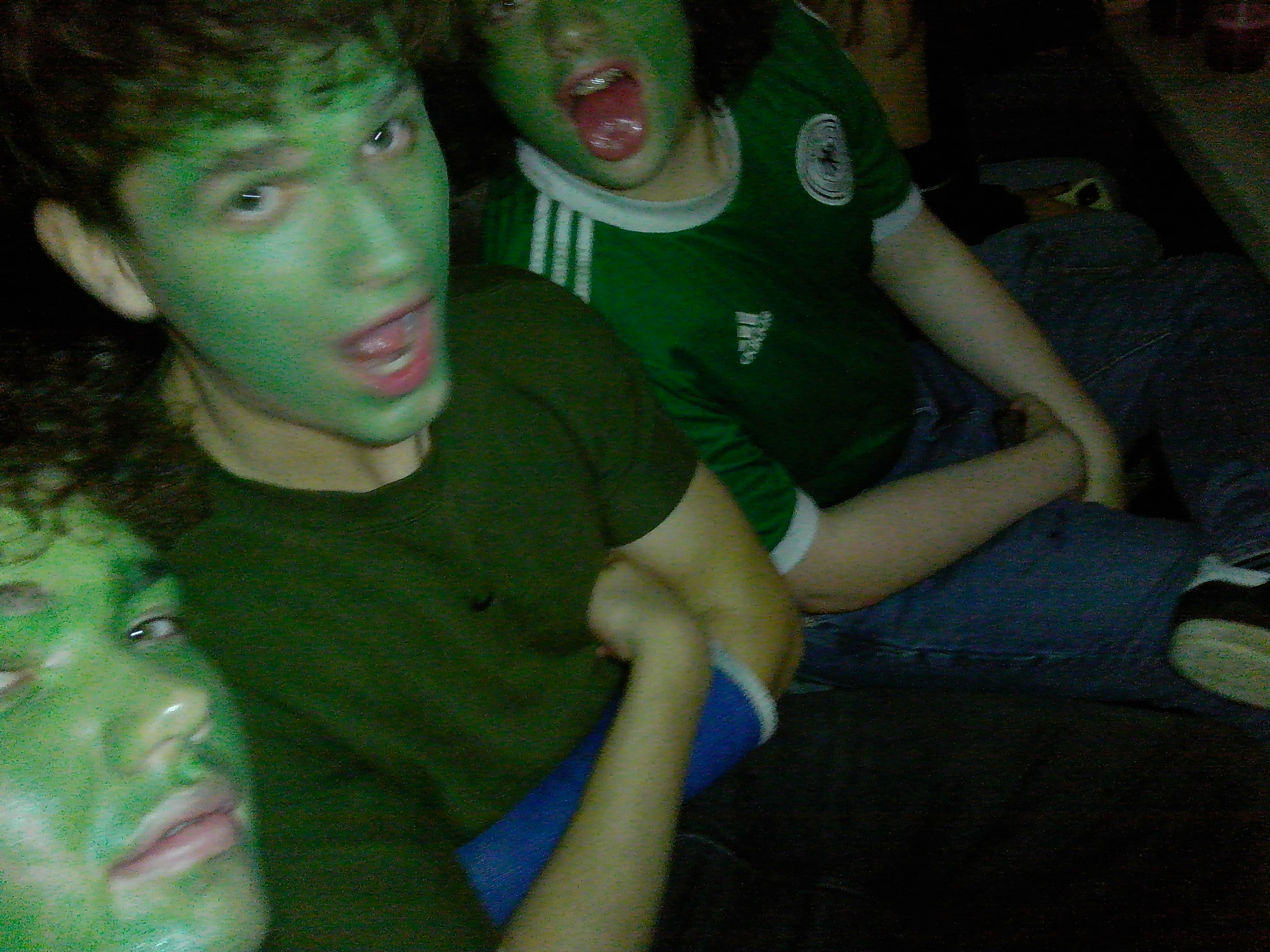 Members with face paint messing about at a social